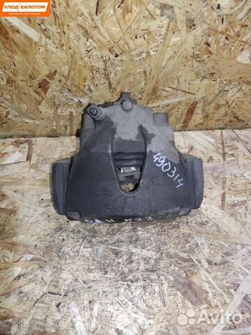 Суппорт тормозной передний правый Opel Astra H