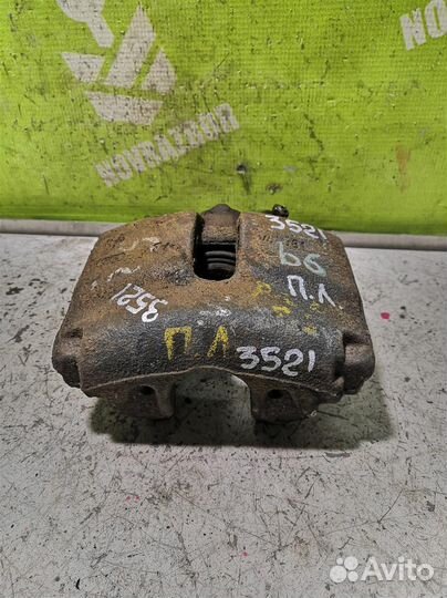 Суппорт передний левый Фольксваген Пассат Б6