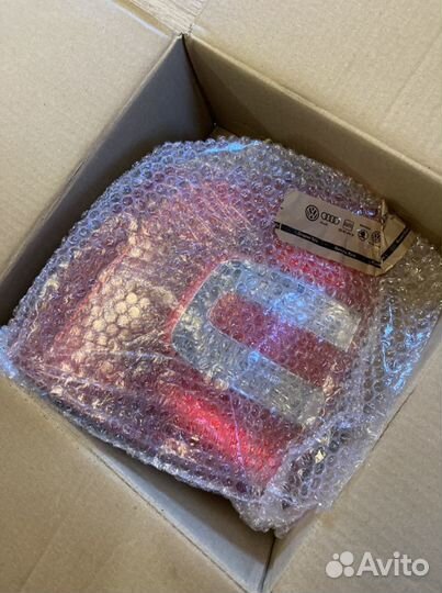 Фонарь задний левый Skoda оригинал