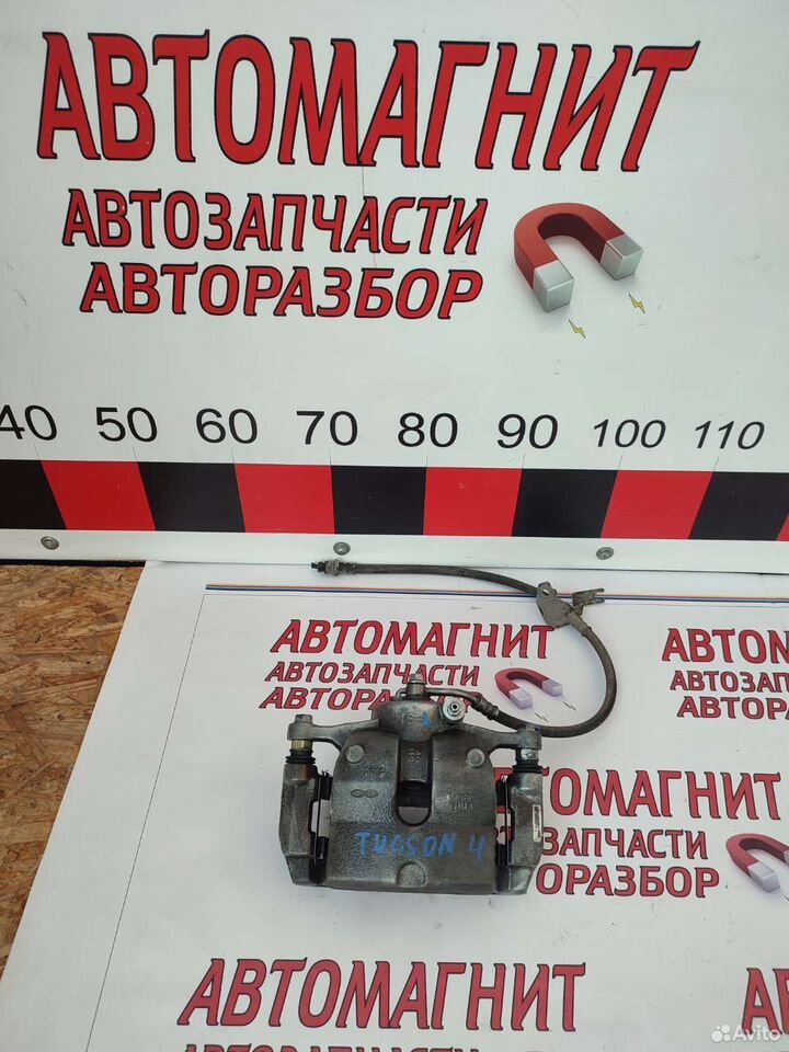 Супорт передний левый Хендай Туксон 4 20-н.в