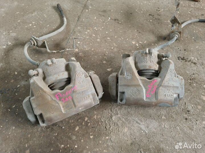 Суппорт тормозной передний Renault Fluence седан