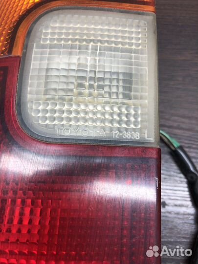 Задний фонарь левый Toyota Corolla 100 универсал