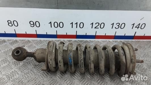 Стойка передняя левая nissan navara D40 (DEA13SJ01