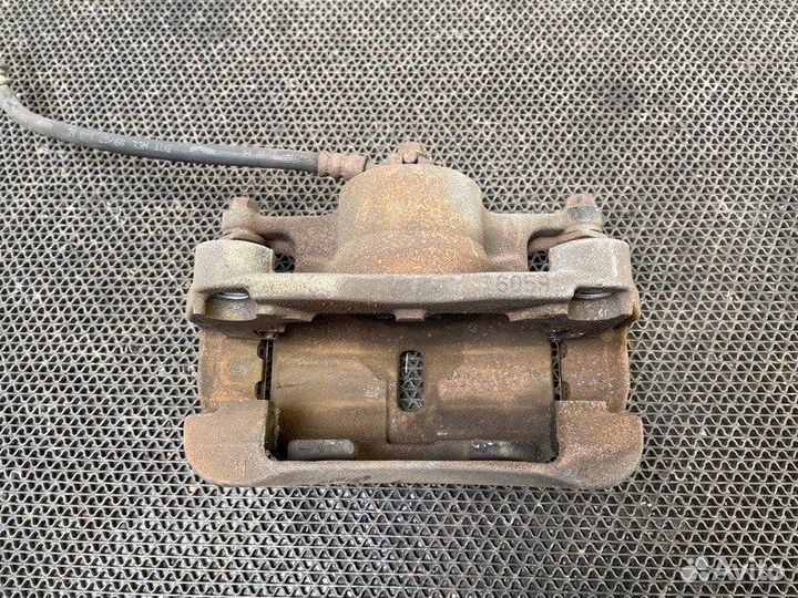 Суппорт передний левый Nissan X-Trail T31