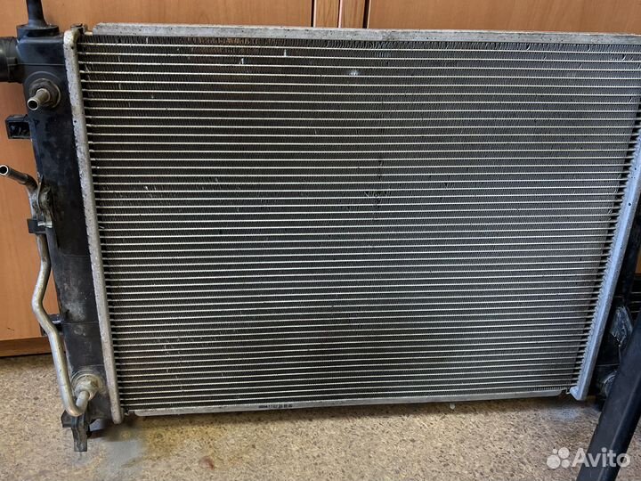 Радиатор Солярис 1 рест АКПП оригинал 253104L050