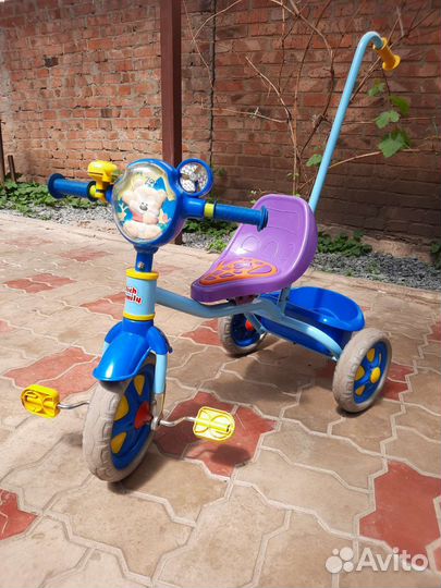 Трехколесный велосипед с ручкой