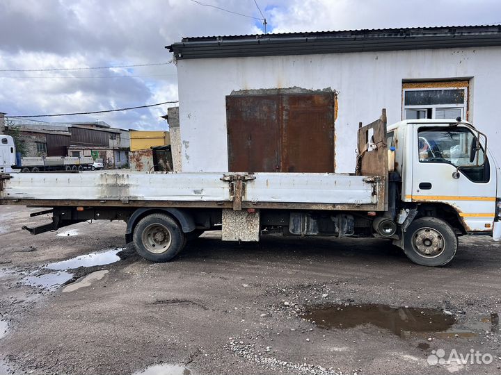 Бортовой грузовик Isuzu NQR75P, 2009