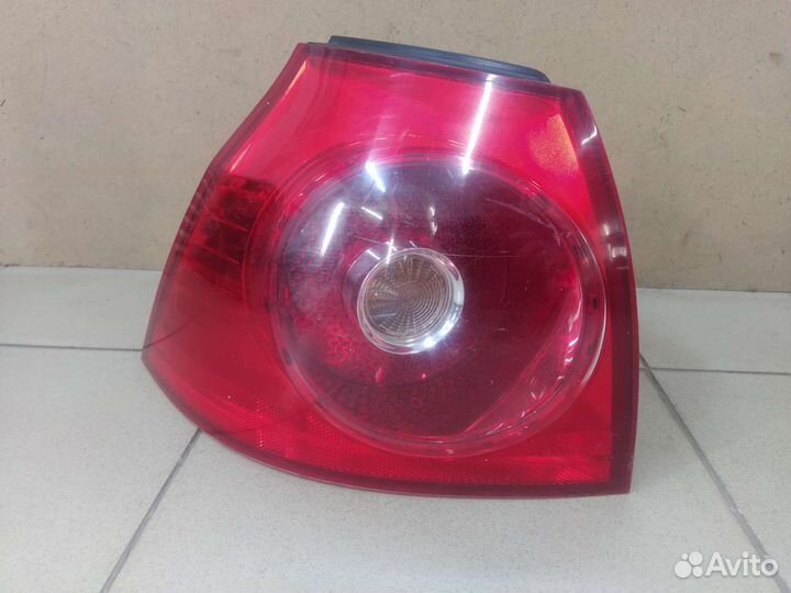 Фонарь левый Фольксваген Гольф 5