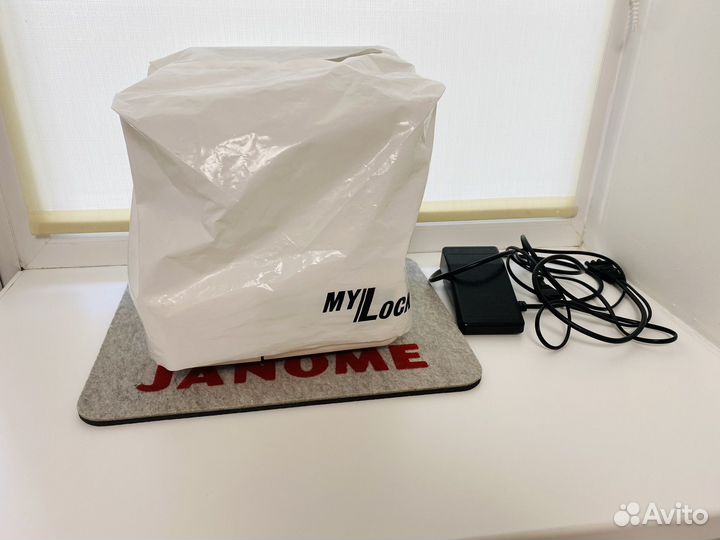 Оверлок janome