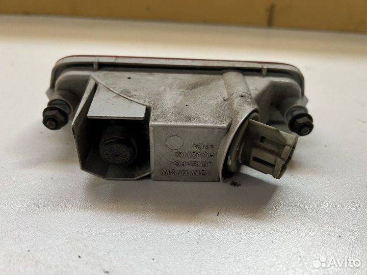 Фонарь противотуманный задний Nissan Almera G15