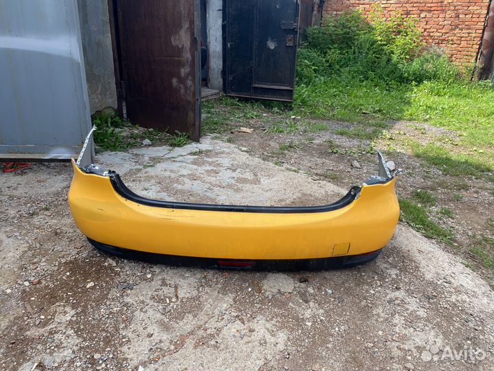 Задний бампер Nissan almera g15