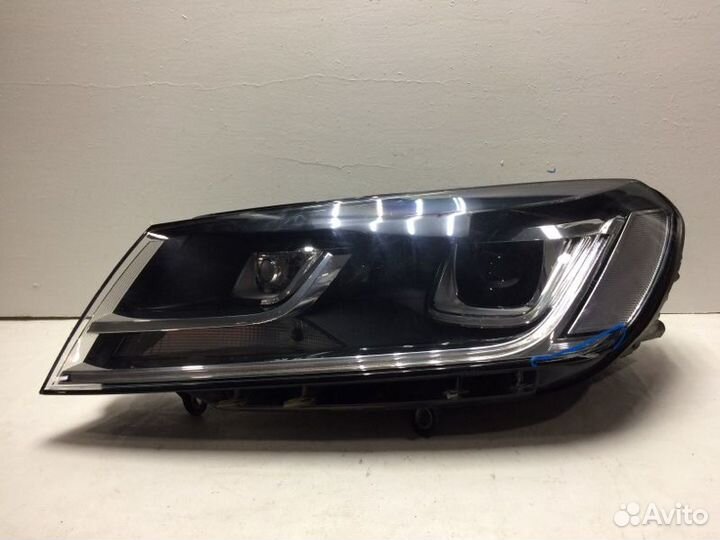 Фара левая Volkswagen Touareg