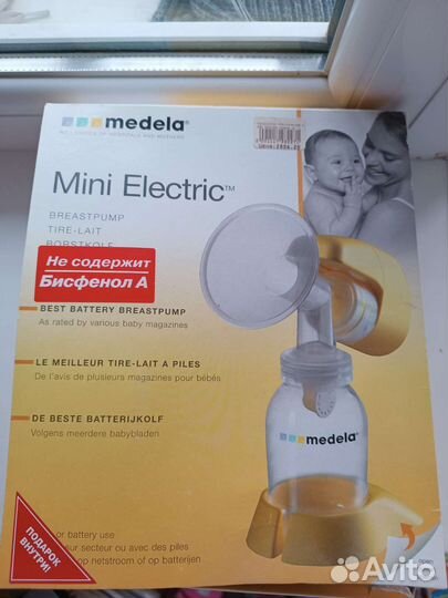 Молокоотсос medela электрический