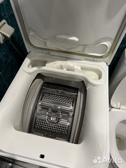 Electrolux с вертикальной загрузкой