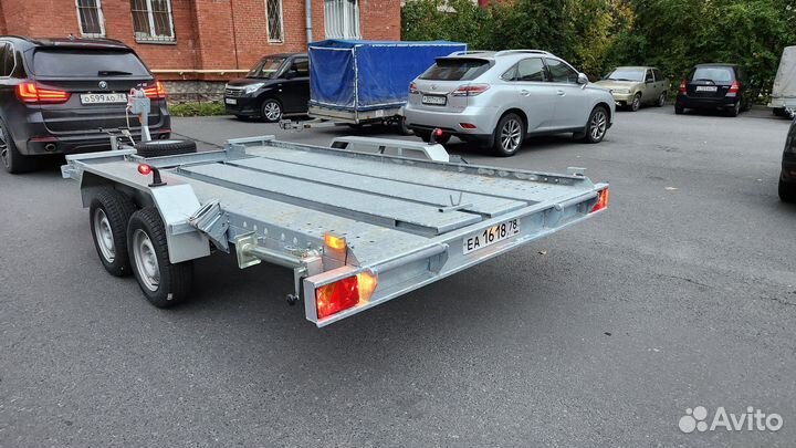 Прицеп легковой двухосный с тормозами