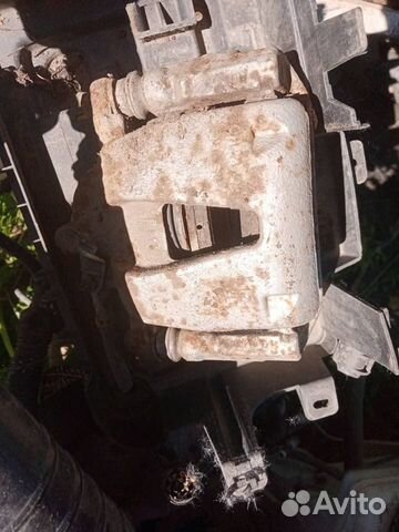 Суппорт тормозной передний Opel Corsa D