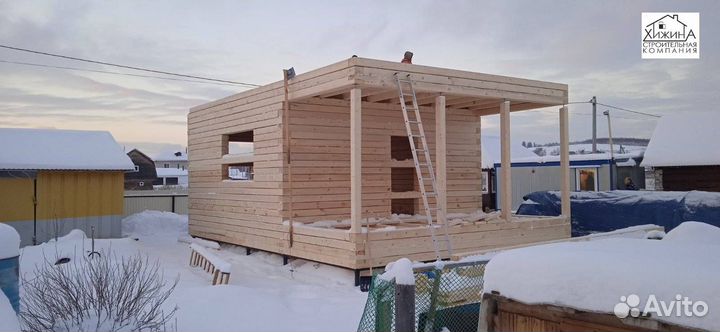 Срубы дома из бруса 6х6 с выносом отделка