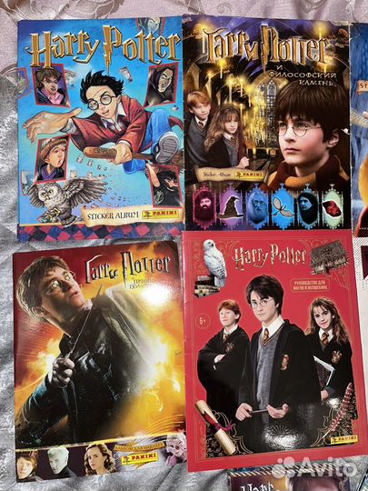 Заполненные альбомы Гарри Поттер и твари Роулинг