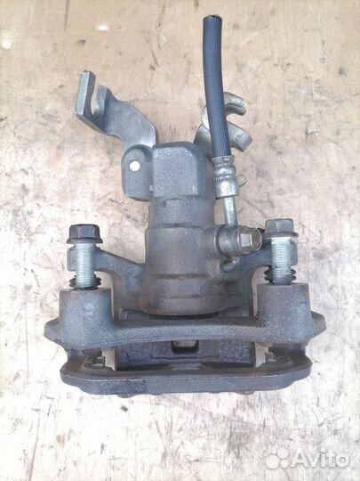 Задний тормозной суппорт Мазда 6 GG