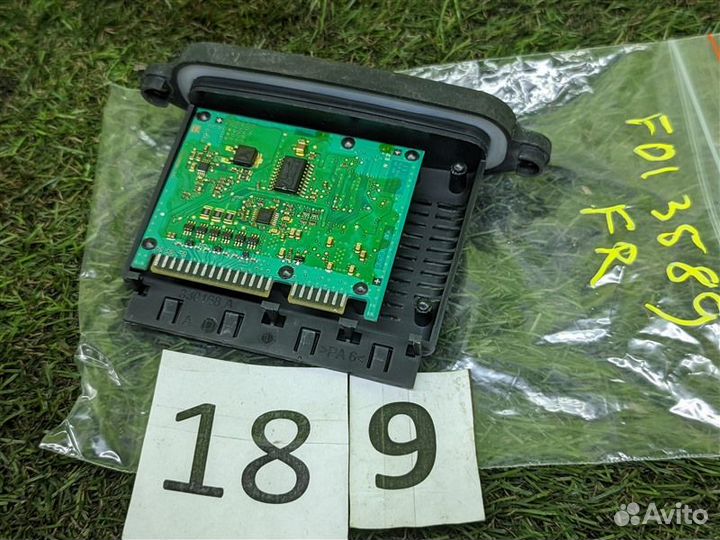 Блок управления фарами передний правый Bmw 750I