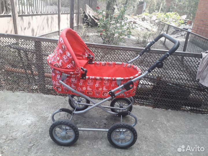 Игрушечная коляска для кукол