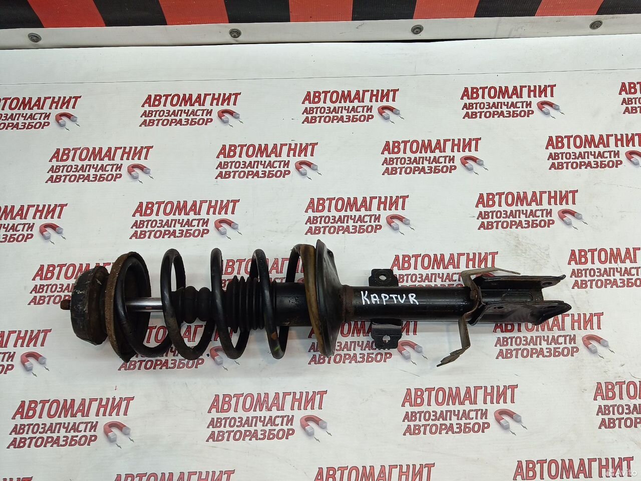 Амортизатор стойка передняя Рено Каптюр