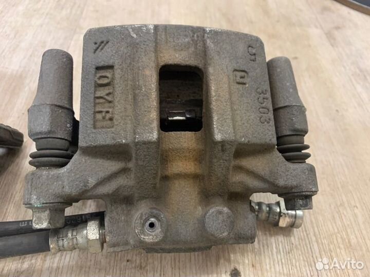 Суппорта и диски задняя Mitsubishi Lancer 10 CY3A