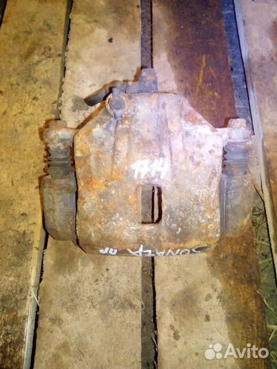 Суппорт тормозной передний правый Hyundai Sonata