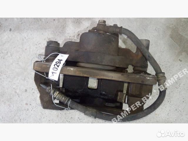 Суппорт тормозной передний правый Mazda Premacy 1