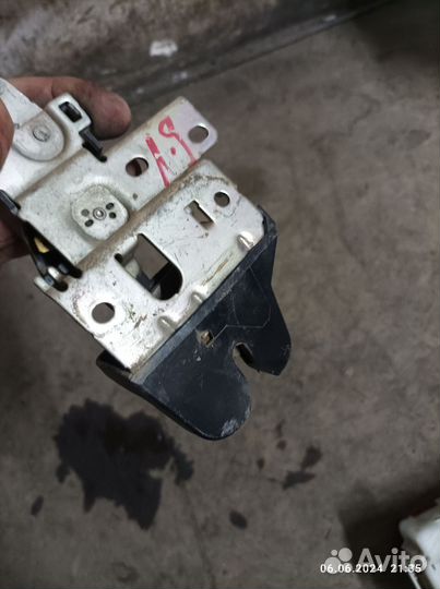 Замок багажника лансер 9