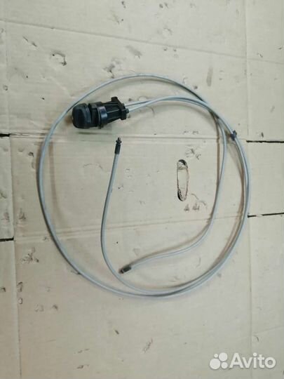 Трос гидрокорректора Рено Логан 2