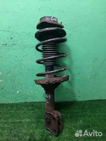 Стойка амортизатора передняя левая Subaru Foreste