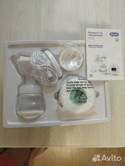 Молокоотсос электрический новый