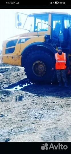 Водитель шарнирно сочлененного самосвала