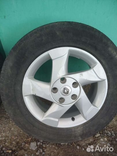 Bridgestone A001 Weather Control 215/65 R16