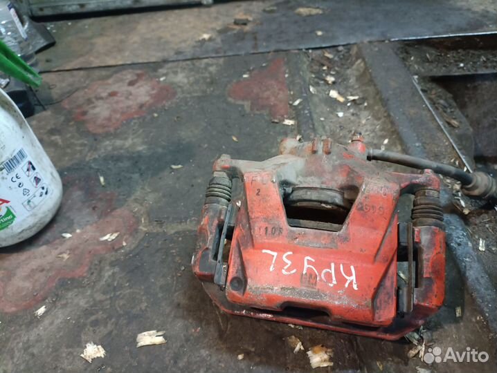 Суппорт передний левый Chevrolet Cruze