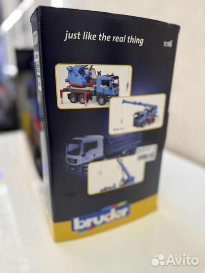 Подъемный кран игрушечный Bruder MAN синий