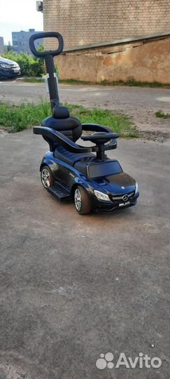 Машинка каталка с ручкой