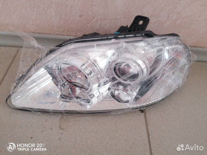 Фара передняя левая Sma C31