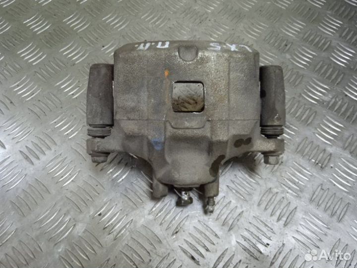 Суппорт передний правый Mitsubishi Lancer седан