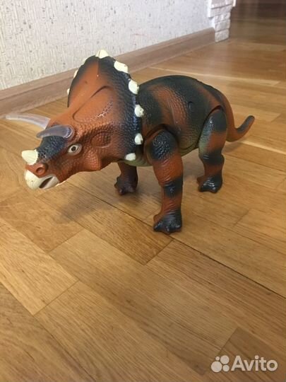 Игрушка на пульте динозавр