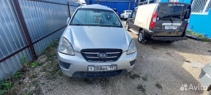 Капот Kia Carens