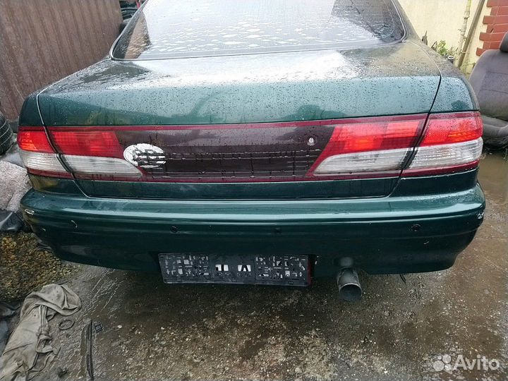 Задний бампер Nissan Maxima QX(A32)