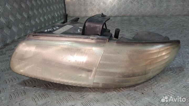 Фара 04897389AA Chrysler Voyager (1996-2000)