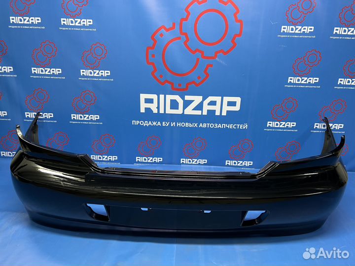 Бампер задний Kia Spectra