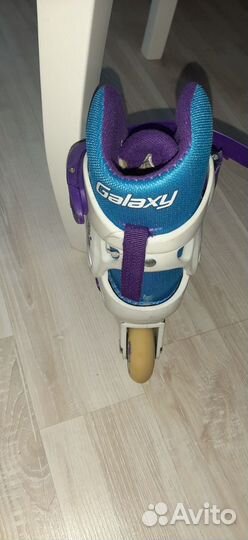 Роликовые коньки