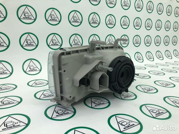 Фара основная левая для Nissan Primera II P11