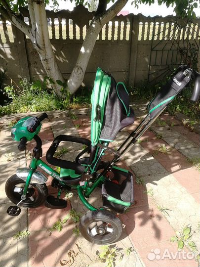 Трехколесный велосипед с ручкой