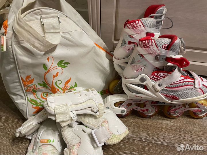 Роликовые коньки