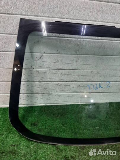 Стекло заднее Nissan Tiida 2008